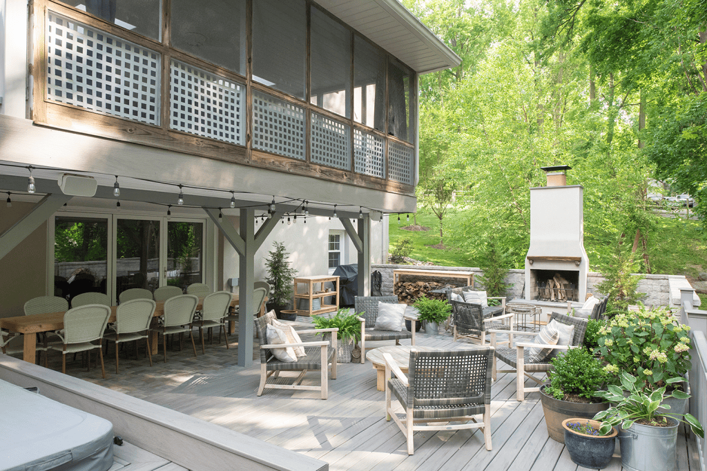Huge outdoor living space with screened in deck and patio beneath