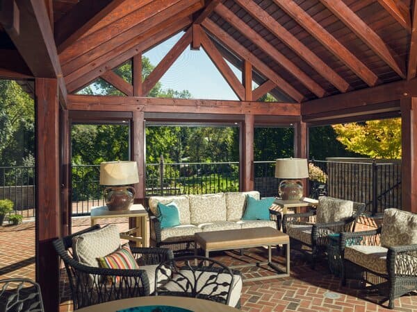Outdoor living space of a patio including a wooden roof