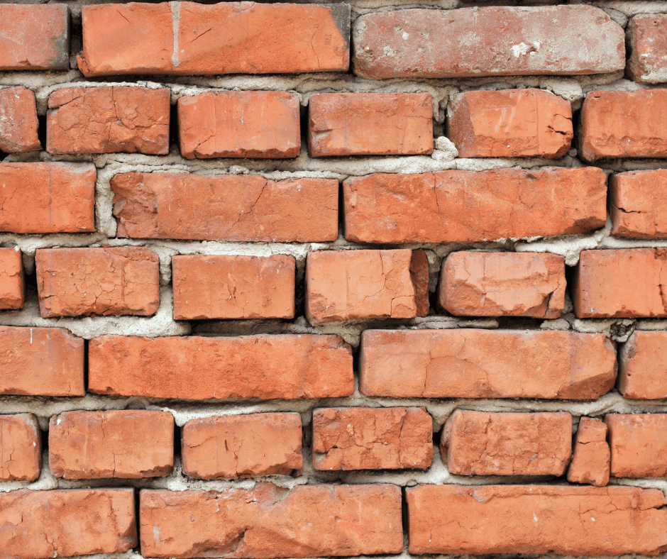 A damaged brick wall