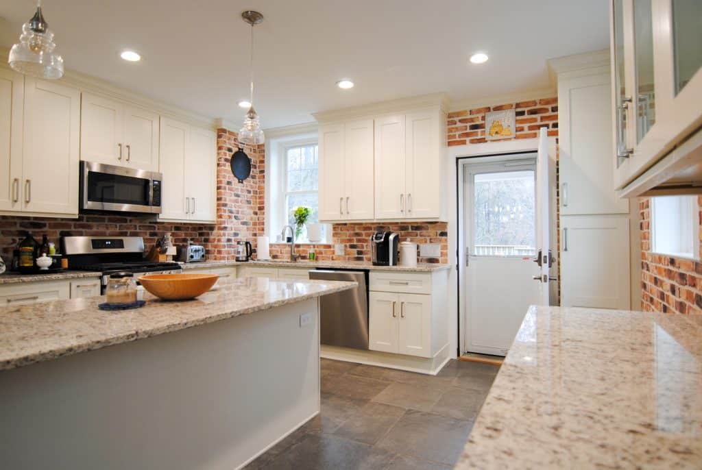 Updated kitchen with brick backsplash