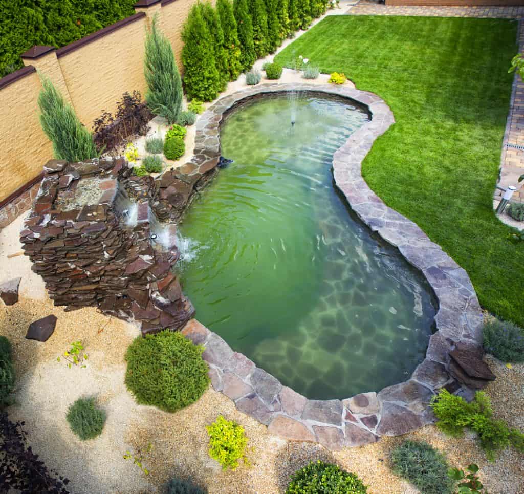 Fountain with two overflows, in antique style. Using natural materials such as wild marble, slate, granite and basalt.