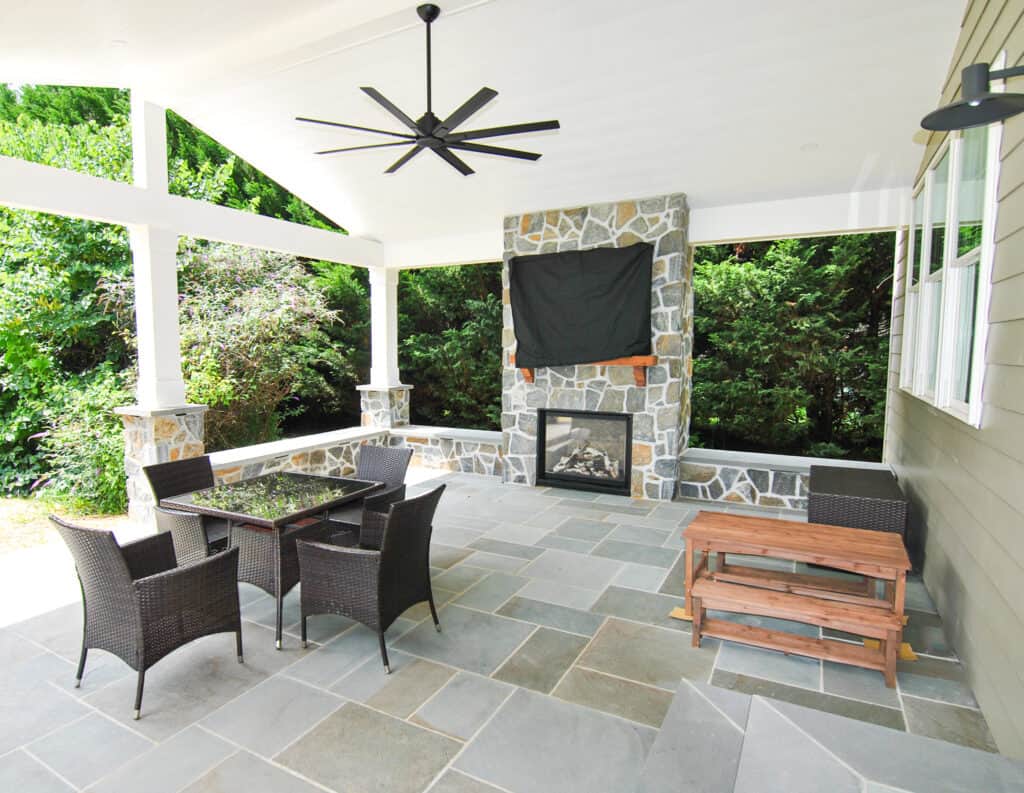 patio with an outdoor fireplace